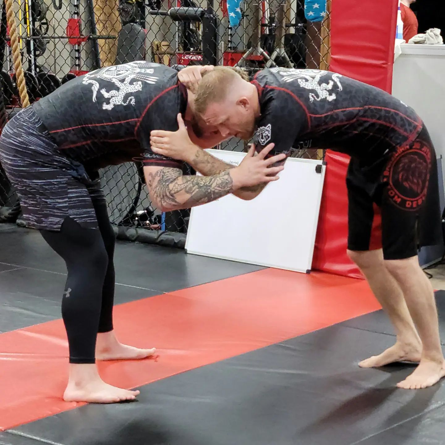 BJJ Couture Leopard Print Black & Red Rashguard